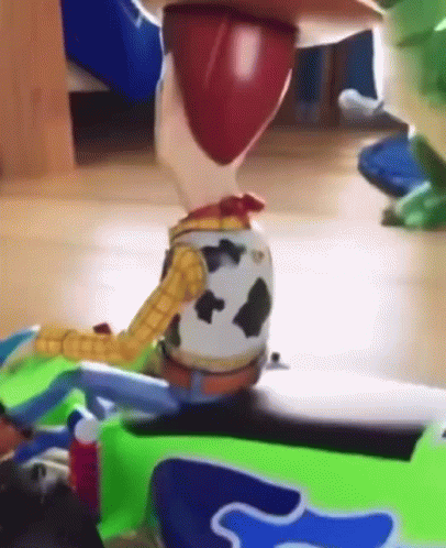 Woody Toy Sitting On Toy Car GIF