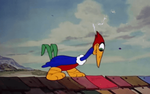 Woody Woodpecker Standing on Roof With Lightning Bolt Out of Mouth