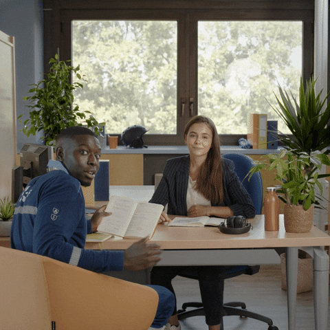 Work Collaboration Man And Woman In Table GIF