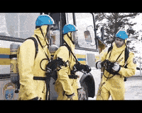 Workers On Break Removing Hazmat Suit GIF