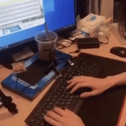 Working And Doing Fast Typing GIF