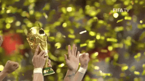 World Cup Trophy With Gold Confetti GIF
