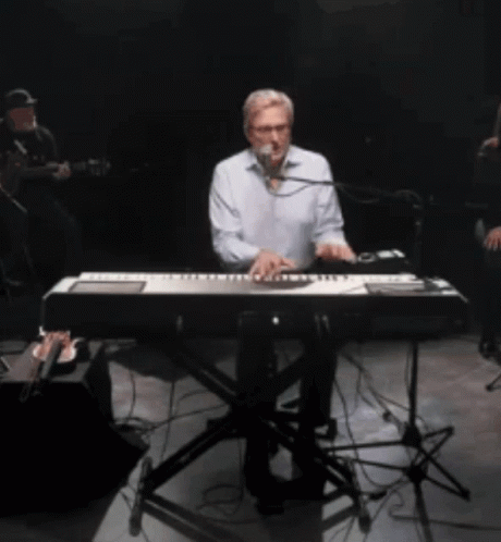 Worship Doen Moen Playing Piano And Singing GIF
