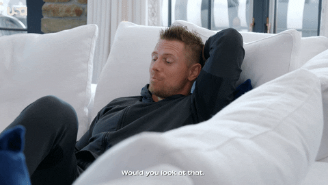 Would You Look At That Relaxing In Couch GIF