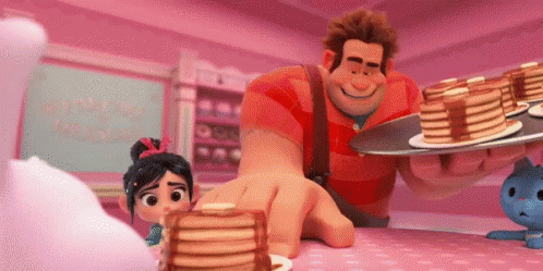 Wreck It Ralph Is Holding A Tray Of Pancakes And A Stack Of Pancakes On A Table . GIF