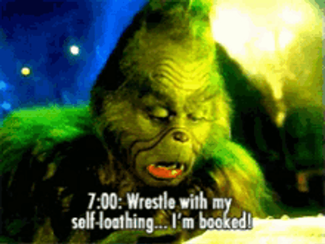 Grinch In Christmas Outfit Awkward Smile GIF 