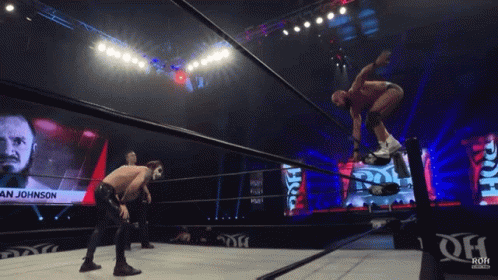 Wrestler An Johnson Jumping Over Ropes