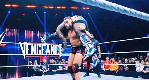 Wrestler Carrying Another in Vengeance Match