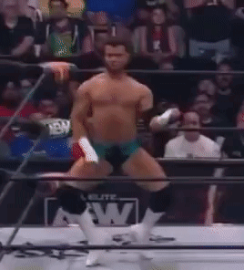 Wrestler Dancing in Ring with Crowd