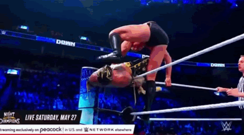 Wrestler Doing Handstand In Ring GIF