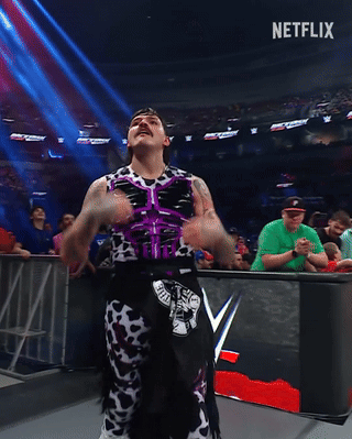 Wrestler Flexes Muscles Before Crowd And Netflix Sign GIF