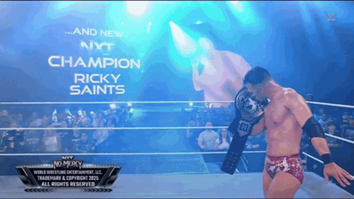 Wrestler Holding Champion Belt GIF