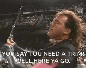 Wrestler Holding Gun Saying You Say You Need a Trim Well Here Ya Go