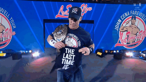 Wrestler Holding Shirt Saying The Last Time GIF