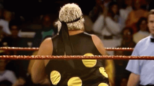 Wrestler in Black and Yellow Polka Dot Shirt