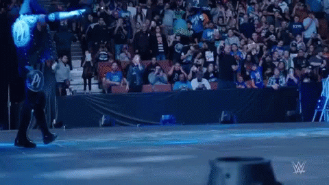 Wrestler in Blue Shirt with P