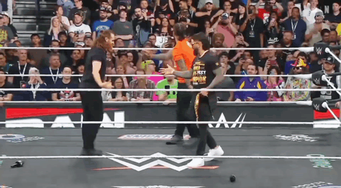 Wrestler in Orange Shirt Saying I Am the Best