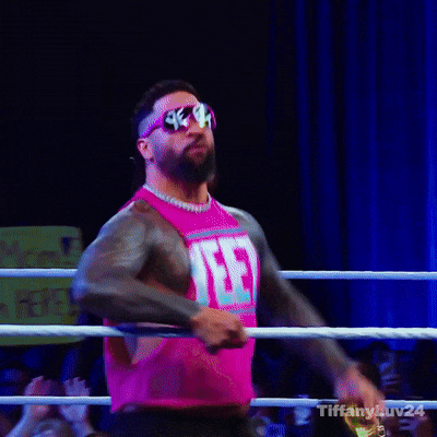 Wrestler in Pink Shirt and Sunglasses