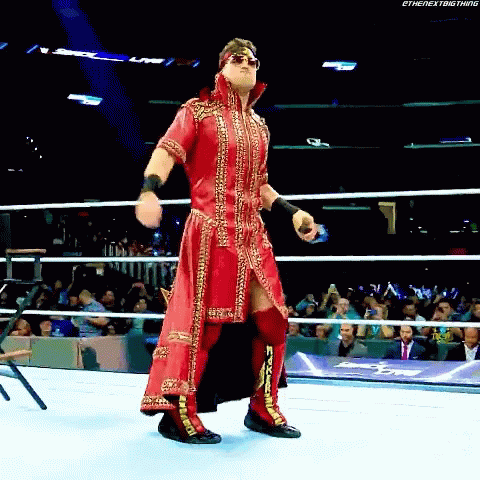 Wrestler in Red Robe and Sunglasses
