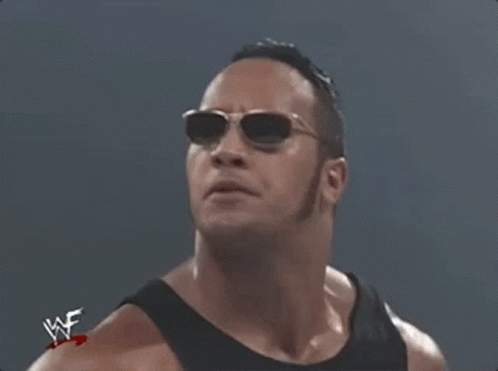 Wrestler in Sunglasses and Black Tank Top with WWE