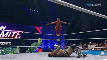 Wrestler Jumping Over Another In Dynamite Ring GIF