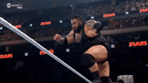 Wrestler Jumping Over Rope During Match