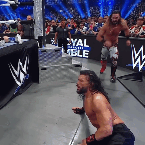 Wrestler Kneeling Before Royal Napoli Ble Sign