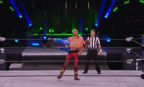 Wrestler Lifted Into Air By Another Wrestler GIF