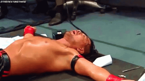 Wrestler Lying Face Down Arms Outstretched