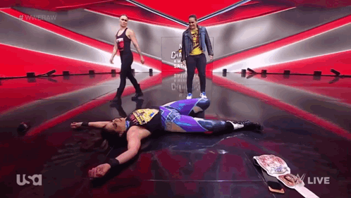 Wrestler Lying on Ring Floor
