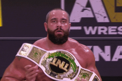 Wrestler Miro Presenting Championship Belt GIF