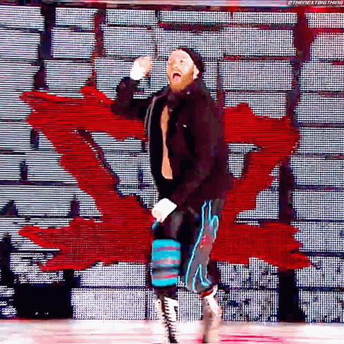 Wrestler on Stage with Red Canadian Flag