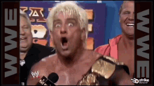 wrestler-ric-flair-woo-glowing-eyes-d3ppmllxbvxkwlxw.gif