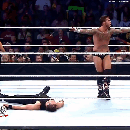 Wrestler Standing With Arms Out GIF