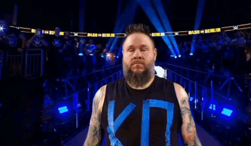 Wrestler With Beard and Tattoos in Ring