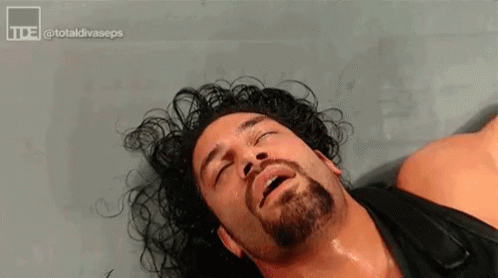 Wrestler with Beard Lying Down