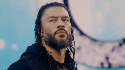 Wrestler With Long Hair And Beard On Stage GIF