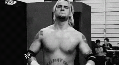Wrestler Without Shirt Standing in Ring