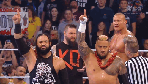 Wrestlers In A Ring With One Wearing A Shirt That Says Kd On It GIF
