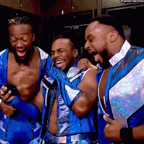 Wrestlers Laughing At Cell Phone GIF