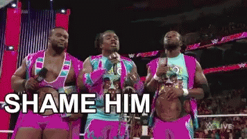 Wrestlers Standing Shame Him GIF