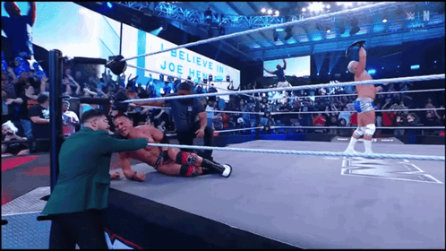 Wrestling Match With I Believe In Joe Henry Sign GIF