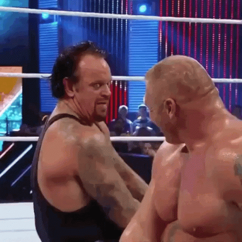 Wrestling Men in Ring