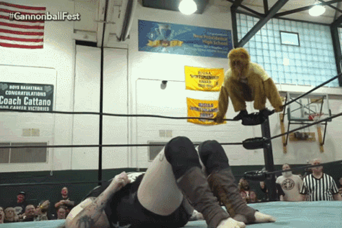 Wrestling Ring With Coach Cattano Sign GIF