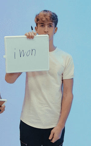 Written I Won On White Board GIF