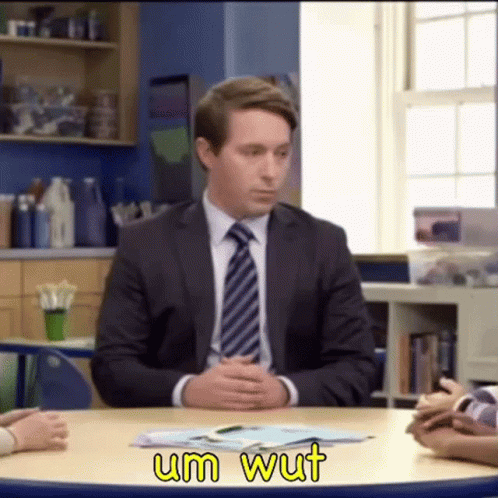 Man Seating Cant Believe Wut Reaction GIF
