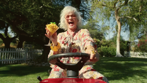 Old Lady Happily Driving Around GIF