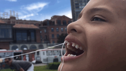 Yarn Pulling Kid No Teeth GIF