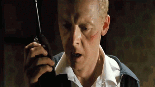 Yarp Hot Fuzz Simon Pegg Walkie Talkie GIF