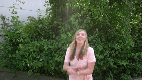 Yasssss Vibrant Lady Jumping From Excitement GIF